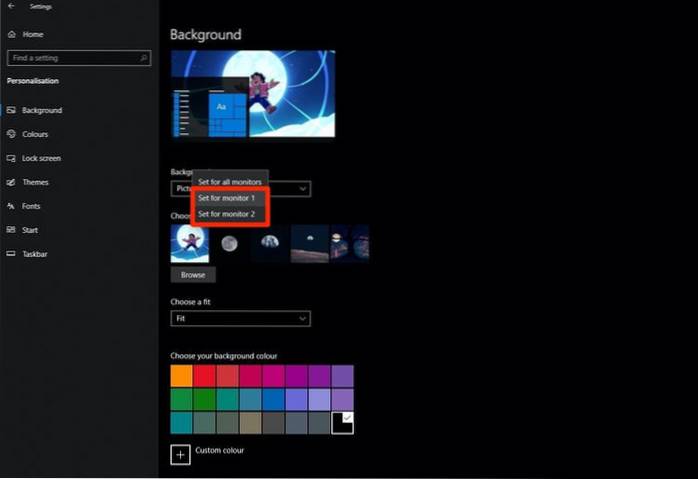 Så här ställer du in en annan bakgrund på den andra skärmen i Windows 10