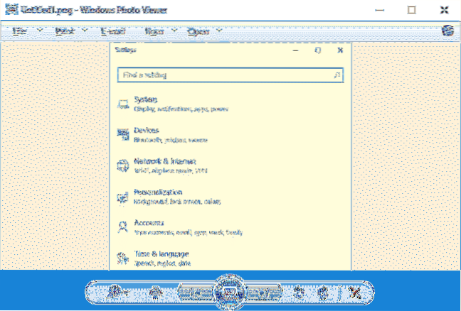 Prohlížeč fotografií v systému Windows zobrazuje při náhledu obrázků pozadí žlutého odstínu