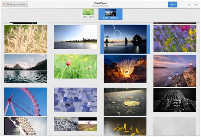Så här ställer du in olika bakgrundsbilder på varje bildskärm på Linux GNOME