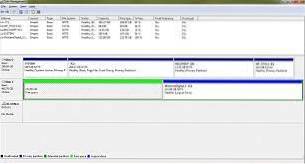 hur man tar bort ledigt utrymme partition i Windows 7